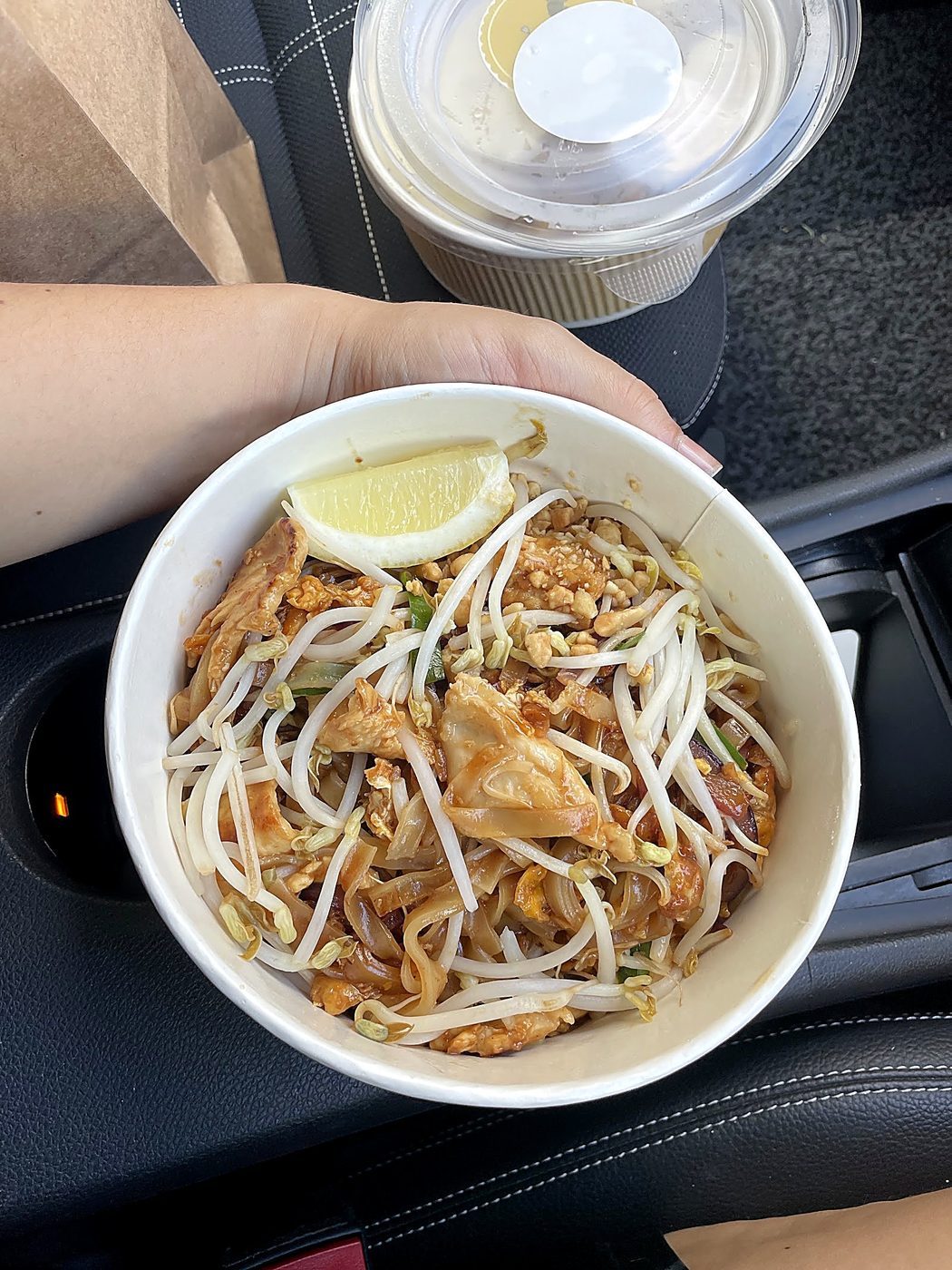 Wok-tossed Chicken Pad Thai with lemon wedge